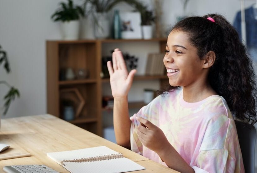 confident girl answers virtual learning